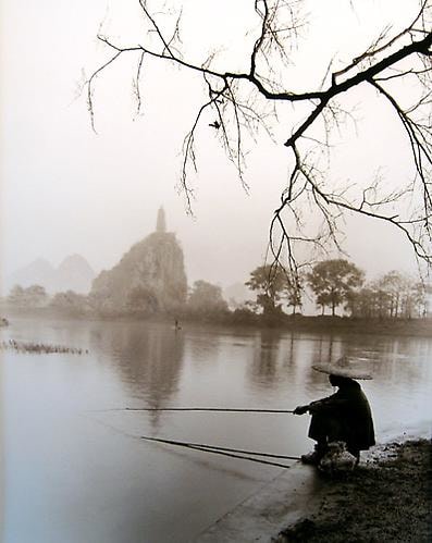 Don Hong Oai, Waiting, Guilin, 1984, sepia-toned gelatin silver print, 11 x 14 inches. &copy; Don Hong Oai