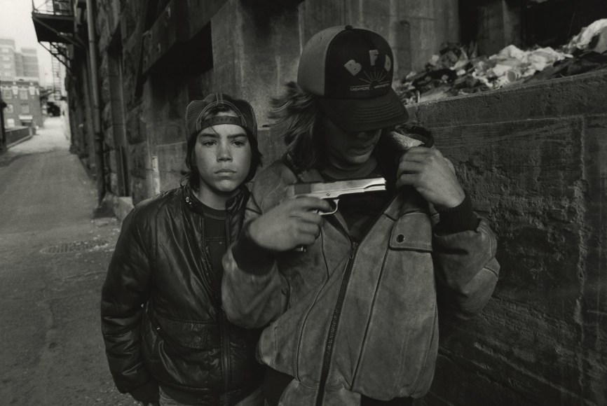 Rat and Mike with a gun. Seattle, Washington, 1983, Silver Gelatin Photograph