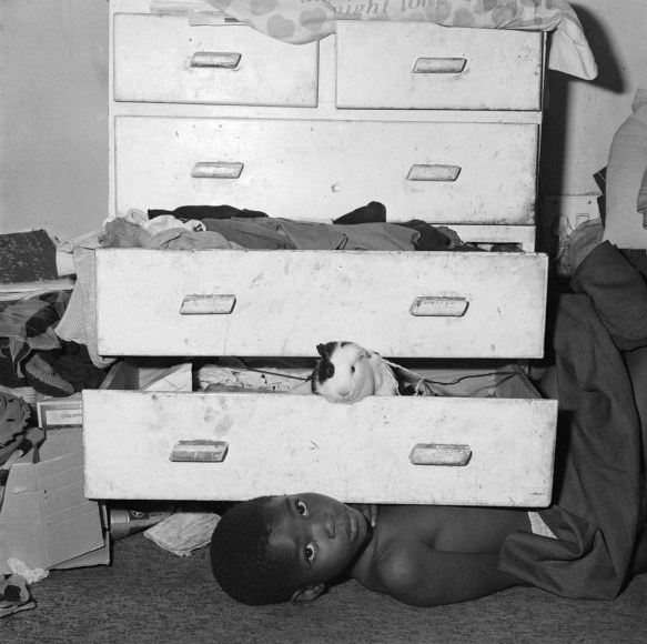 Child under Chest of Drawers, 2000, Silver Gelatin Photograph