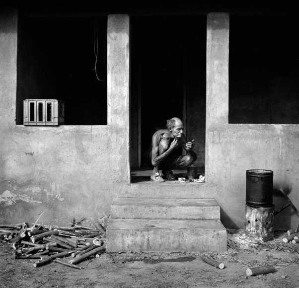 Man Shaving on Veranda, Western TVL 1986, Silver Gelatin Photograph