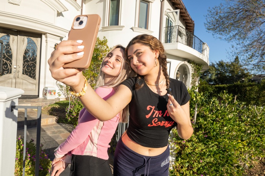 Making TikToks Holly and Bella, both 17, Pacific Palisades. Bella, left, was slut shamed on social media to the point where she didn't want to leave the house, 2021