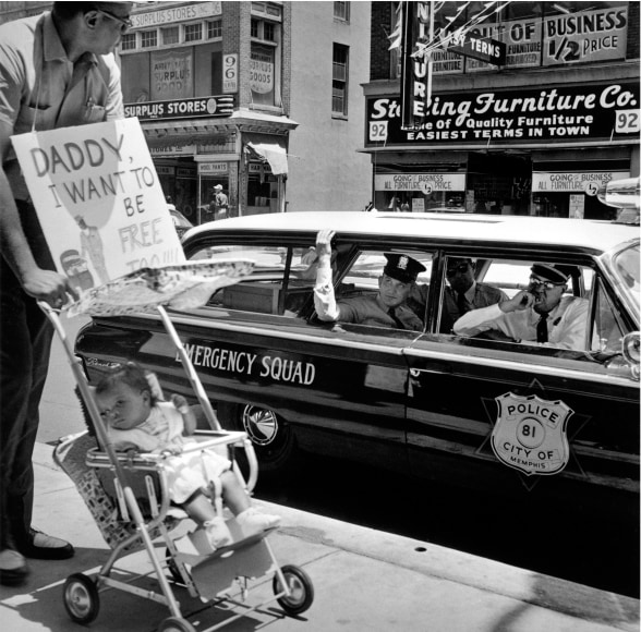 William Edwin Jones pushes daughter Renee Andrewnetta Jones (8 months old) during protest, Main Street, Memphis, Tennessee, ca. 1950’s, Archival Pigment Print
