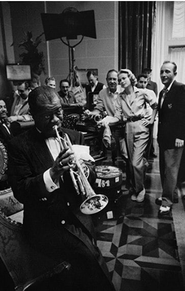 Louis Armstrong plays an impromptu concert for Bing Crosby, Grace Kelly and the crew on the set of "High Society", 1956, Archival Pigment Print