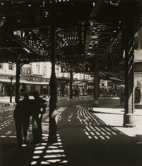 BERENICE ABBOTT (1898–1991), "El, Second and Third Avenue Lines, Bowery and Division Streets, Manhattan," 1936. Gelatin silver print, 9 1/2 x 7 5/8 in.