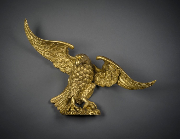 Eagle  American (probably Philadelphia) Possibly by William Rush (1756&ndash;1833), about 1810 Wood, carved, gessoed, and gilded, 27 3/8 in. high, 35 3/4 in. wide, 12 5/8 in. deep (overall).