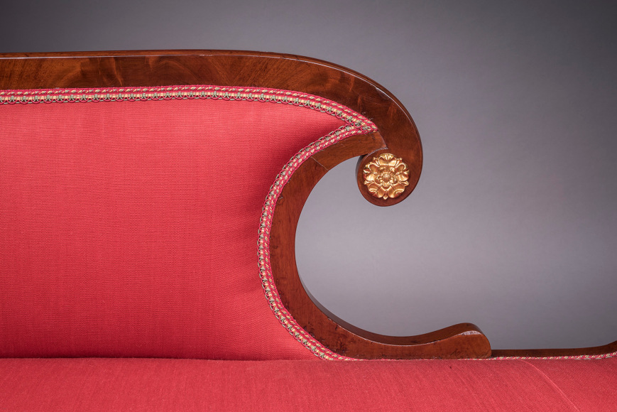 R&eacute;camier in the Neo-Classical Taste, about 1820. Attributed to Duncan Phyfe, New York. Mahogany, partially gilded and painted verde antique, with die-stamped gilt-brass mounts, &shy;bolster buttons, and castors, and die-stamped brass inlaid with ebony. 32 in. high, 82 3/4 in. long, 24 1/2 in. deep