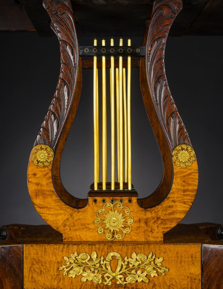 Card Table with Lyre Base, about 1815. Philadelphia. Mahogany, with gilt-brass paw toe caps and castors, strings for the lyres, and gilt-brass and ormolu mounts 28 1/2 in. high, 35 in. wide, 17 1/2 in. deep (at the top), 18 in. deep (at the castors). Detail of open lyre pedestal.