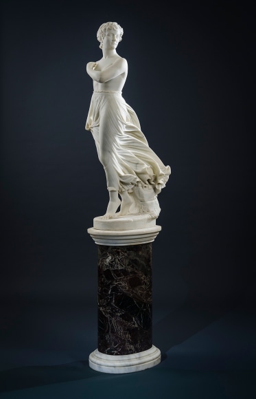 THOMAS RIDGEWAY GOULD (1818–1881), "The West Wind," 1874. Marble, 48 in. high. On original 3-piece marble pedestal, 33 in. high.
