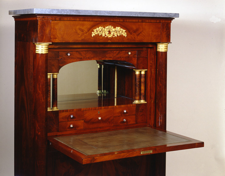 Secr&eacute;taire &agrave; Abattant, about 1820&ndash;25. Attributed to Thomas Emmons and George Archbald, Boston (active together 1814&ndash;25). Mahogany and bird&rsquo;s eye maple, with ormolu mounts, die-rolled gilt-brass moldings filled with lead, marble, mirror plate, and leather, variously blind-stamped and gilded, 57 3/16 in. high, 37 1/4 in. wide, 19 3/4 in. deep. Detail of gallery with desktop opened.