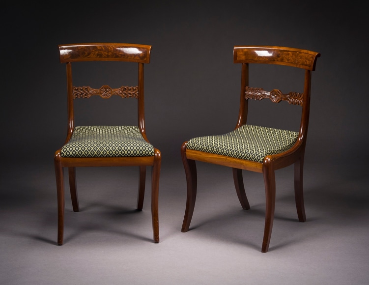 Set of Twelve Klismos-form Dining Chairs, about 1820. Philadelphia. Mahogany, with ebony stringing to crest rails.  33 1/2 in. high, 18 5/8 in. wide, 19 3/4 in. deep (overall)
