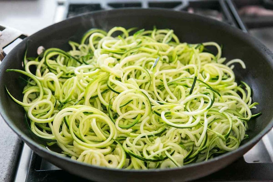 The zucchini ‘noodles’ are barely cooked in olive oil- it’s more that they’re simply steeped and warmed in it- so they retain their crispness and flavor.