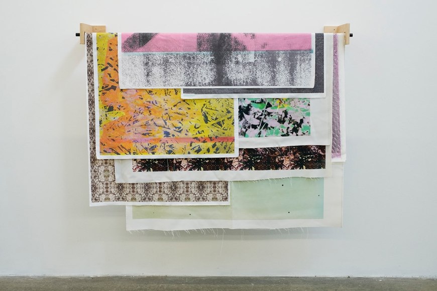 Bryan Graf  Debris of the Days, 2018-ongoing  Modular installation, Inkjet prints on cotten linen fabric, dye sublimation prints, wooden brackets and steel roller bar  Dimensions variable