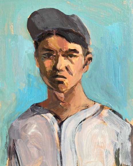 Portrait of young person with baseball hat and uniform