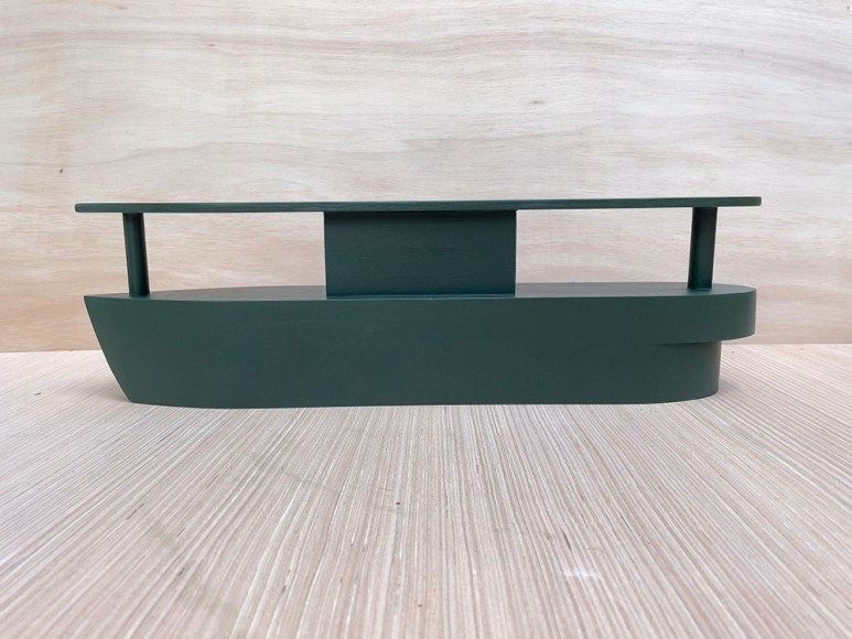 Hand carved wooden boat sculpture by Tom Ashcraft