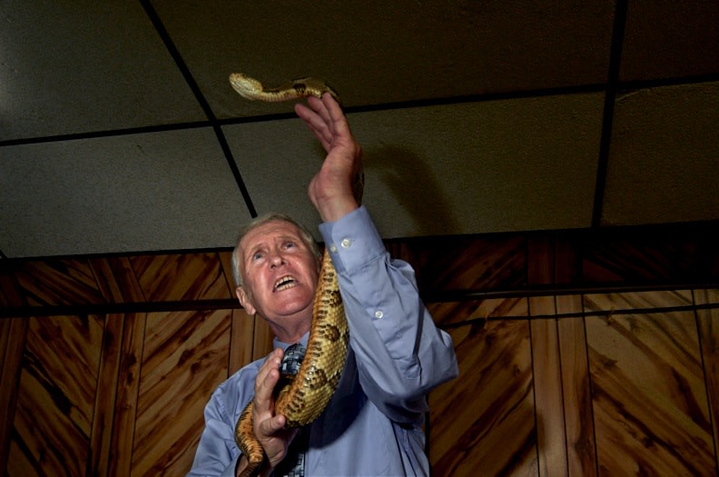 Stacy Kranitz  Jolo, West Virginia, 2011  Archival Pigment Print  16 x 24 inches, Edition of 7  27 x 40 inches, Edition of 3, preacher with snake, West Virginia
