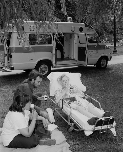 People eating ice cream next to a Para Tour van. Photograph by Mike Smith