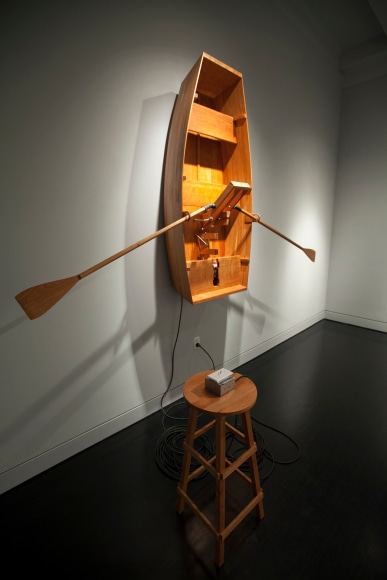 Wooden row boat sculpture, by Tom Ashcraft and Peter Winant