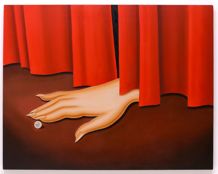 a disconnected email hand with long nails slips under a red curtain to feel a pearl on the floor