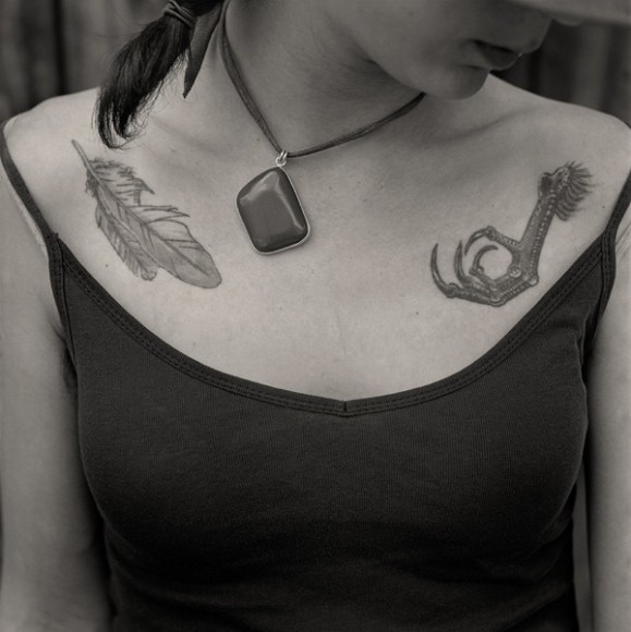 Rob Amberg (1947-)  Kate, Paw Paw, Madison County, NC, 2012  Archival Pigment Print  5h x 5w inches  Edition of 10 - a close up shot of a tattooed upper torso