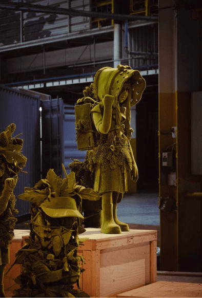 Manifesto of Fragility, Biennale de Lyon 2022. Kim Simonsson, Moss People. Ceramic flocked with a layer of nylon fibre. 16th edition of the Biennale de Lyon, Usines Fagor. Courtesy of the artist. With the support of Frame Contemporary Art FinlanD. &copy; Amande Dionne.