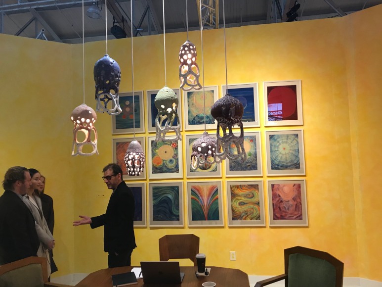 Gallerist Jason Jacques of New York discusses art with Alexander Lloyd, his wife Rachel, and art adviser Holly Baxter at the Fog fair., Photo: Sam Whiting / The SF Chronicle