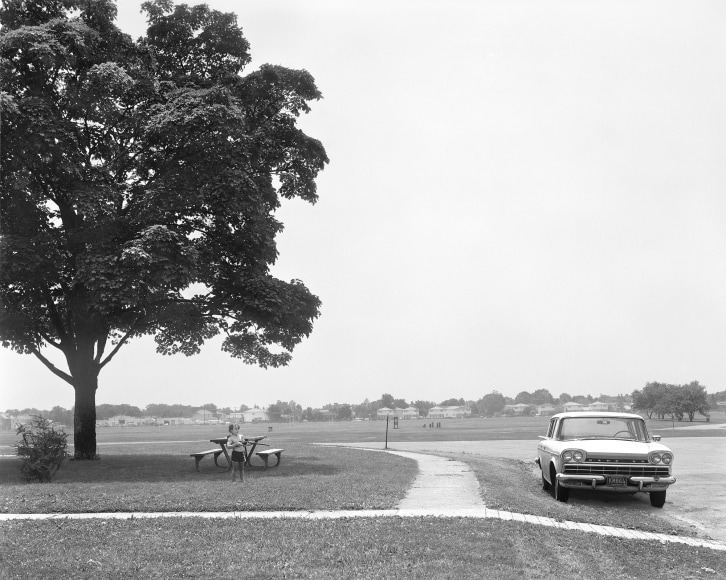 Boy Pointing Rifle at a Car, 1983-84