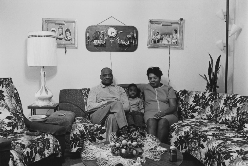 Husband and wife at home with their youngest child , 1968
