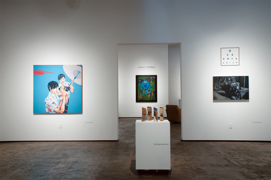 Installation shot of U.C.S.B. M.F.A. 20/20 Exhibition with pieces by Yumiko Glover, Tom Pazderka foreground and Angela Perko installation in background.