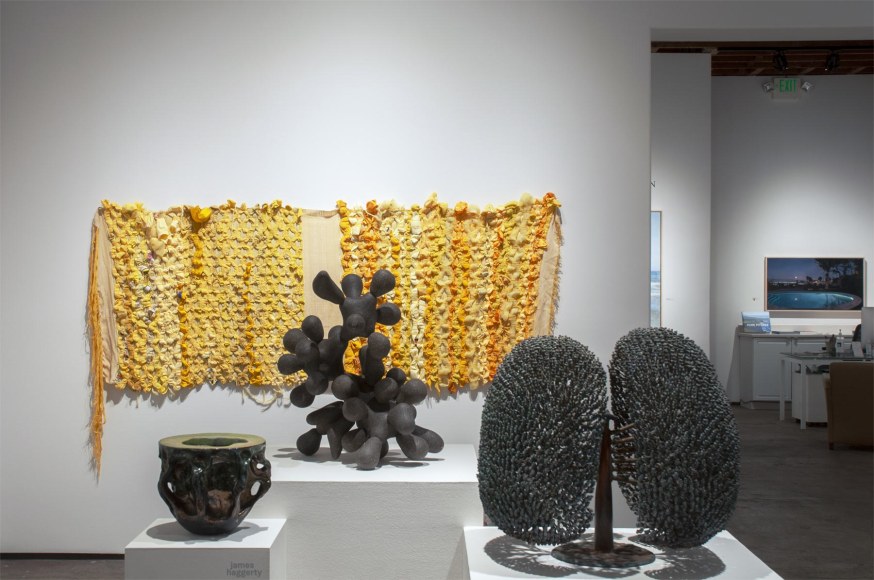 Installation photograph of ORGANIC: Textural &amp; Biomorphic &bull; Abstract &amp; Conceptual: Clay, Wood, Fiber, Paper &amp; Metal, James Haggerty, Brad Miller, Harry Bertoia, and Minga Opazo with Patricia Chidlaw in background