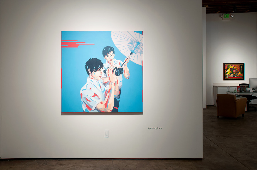 Installation shot of U.C.S.B. M.F.A. 20/20 Exhibition with piece by Yumiko Glover and Angela Perko installation in background.