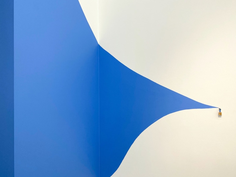 Liliana Porter, Man Painting [Hombre pintando], 2018. Wall installation with acrylic, figurine, and wooden base, variable dimensions