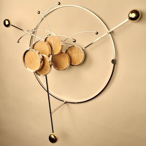 Pedro S. de Movell&aacute;n,&nbsp;MARIPOSA, 2022. Polished aluminum, polished brass, stainless steel, tiger maple,&nbsp;37 x 37 x 7 in.&nbsp;[Maximum Swing] (94 x 94 x 17.8 cm.)