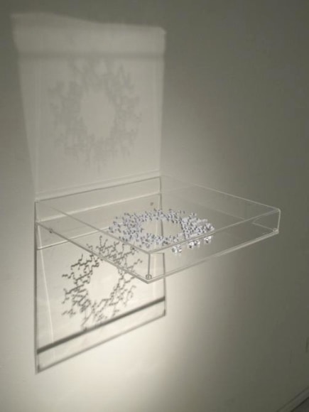 Pedro Tyler, Un grano de arena, 2014. Metal measuring tape and acrylic, 4 3/4 in. x 16 in. x 16 1/4 in.