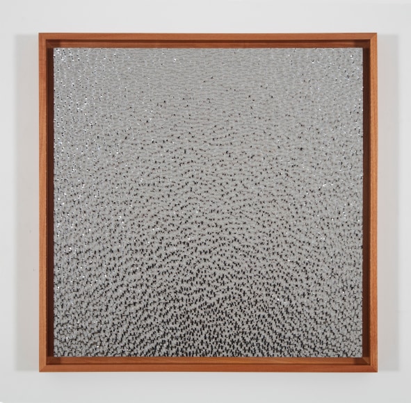 Gabriel de la Mora, 8,684, 2022. 4,372 concave blown glass fragments and aluminum, 4,312 convex blown glass fragments and aluminum on museum cardboard and wood,&nbsp;38 5/8 x 38 5/8 x 2 3/8 in.