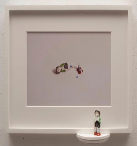 Liliana Porter, Reconstruction [Girl with dark hat], 2018. Framed digital photograph, wooden shelf and porcelain figurine, 13 1/2 x 15 3/4 x 3 1/4 in. (34.3 x 40 x 8.3 cm.)