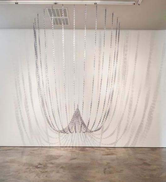 Pedro Tyler, Principio y fin, 2014. Metal measuring tape, Variable dimensions.