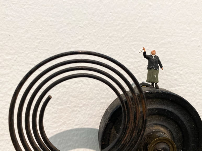 Liliana Porter, The Sign, 2018. Wall installation with metal and painted figurine, 3 x 4 1/2 x 1 1/2 in. (7.6 x 11.4 x 3.8 cm.) detail