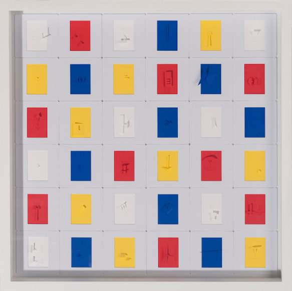 Marco Maggi, Vertical Complot 9, 2017. Slide mounts with 35 mm. cut papers, 12 x 12 in.