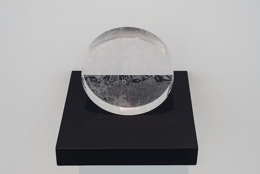 Marco Maggi, Portable Infinite, 2013. X-Acto knife cuts on solid polycast Plexi wheel, 8 in. diameter x 2 in.