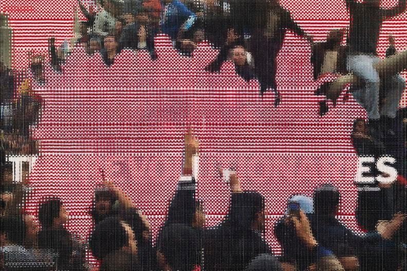 John Sparagana, Crowds &amp;amp; Powder: The Revolutionaries 2, 2013. Fatigued magazine pages with oil stick, sliced and mixed, on paper, 21 in. x 31 1/2 in.