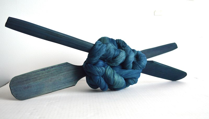 Sandra Monterroso, Efectos Cruzados 12, 2020. Yarn dyed with indig&oacute;fera guatemalensis, and wood, 24 3/4 x 7 13/16 x 5 1/16 in. (63 x 20 x 13 cm.)
