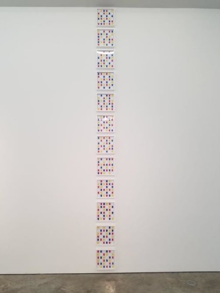 Marco Maggi, Vertical Complot, 2017. 12 frames with slide mounts with 35 mm. cut paper. 12 x 12 in. each / 30.5 x 30.5 cm.