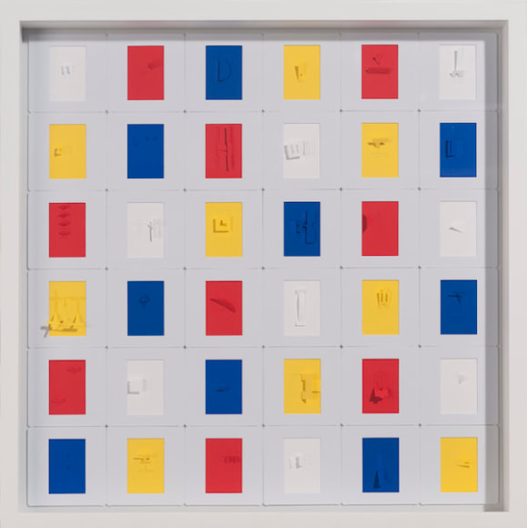 Marco Maggi, Vertical Complot 10, 2017. Slide mounts with 35 mm. cut papers, 12 x 12 in.