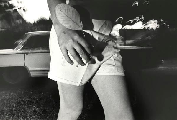 Girl Flashed with Leaf, 1974, 	16 x 20 inch gelatin silver print