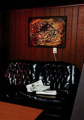 William Eggleston. UNTITLED (BLACK SOFA). 1974.