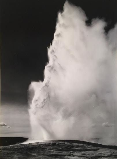 Ansel Adams., 	Old Faithful Geyser, Late Evening. Yellowstone National Park, Wyoming. 1942