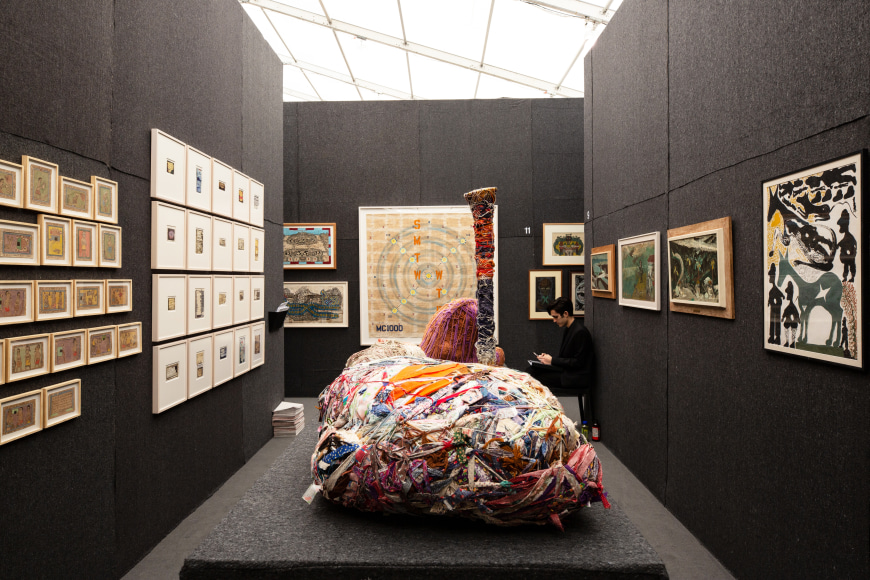 &quot;The Doors of Perception.&quot; Installation view. Photo Olya Vysotskaya., Works, from left: Fr&eacute;d&eacute;ric Bruly Bouabr&eacute;, Melvin Way, George Widener, Scottie Wilson, B&aacute;rbaro Rivas, Carlo Zinelli, and Judith Scott (center).