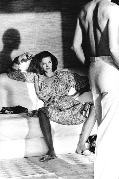 Helmut Newton, Woman Examining Man, St. Tropez, 1975