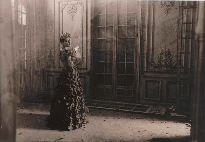 Deborah Turbeville, Charlotte Pelle in Paco Rabanne in an abandoned chateau near Deauville, France, 1985