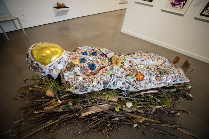 she changed sunset into sunrise (astronaut, female, 8 days pregnant), 2016-18, Found wood, firewood, fresh flowers, astronaut, beeswax, custom pin buttons, earth from the catskills, life